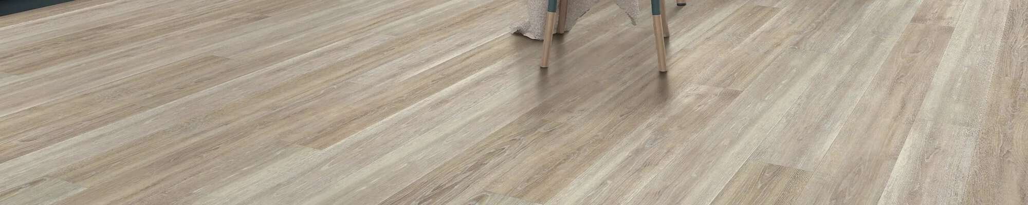 Woman choosing new flooring in the store of Eastern Floor Covering in the Virginia area